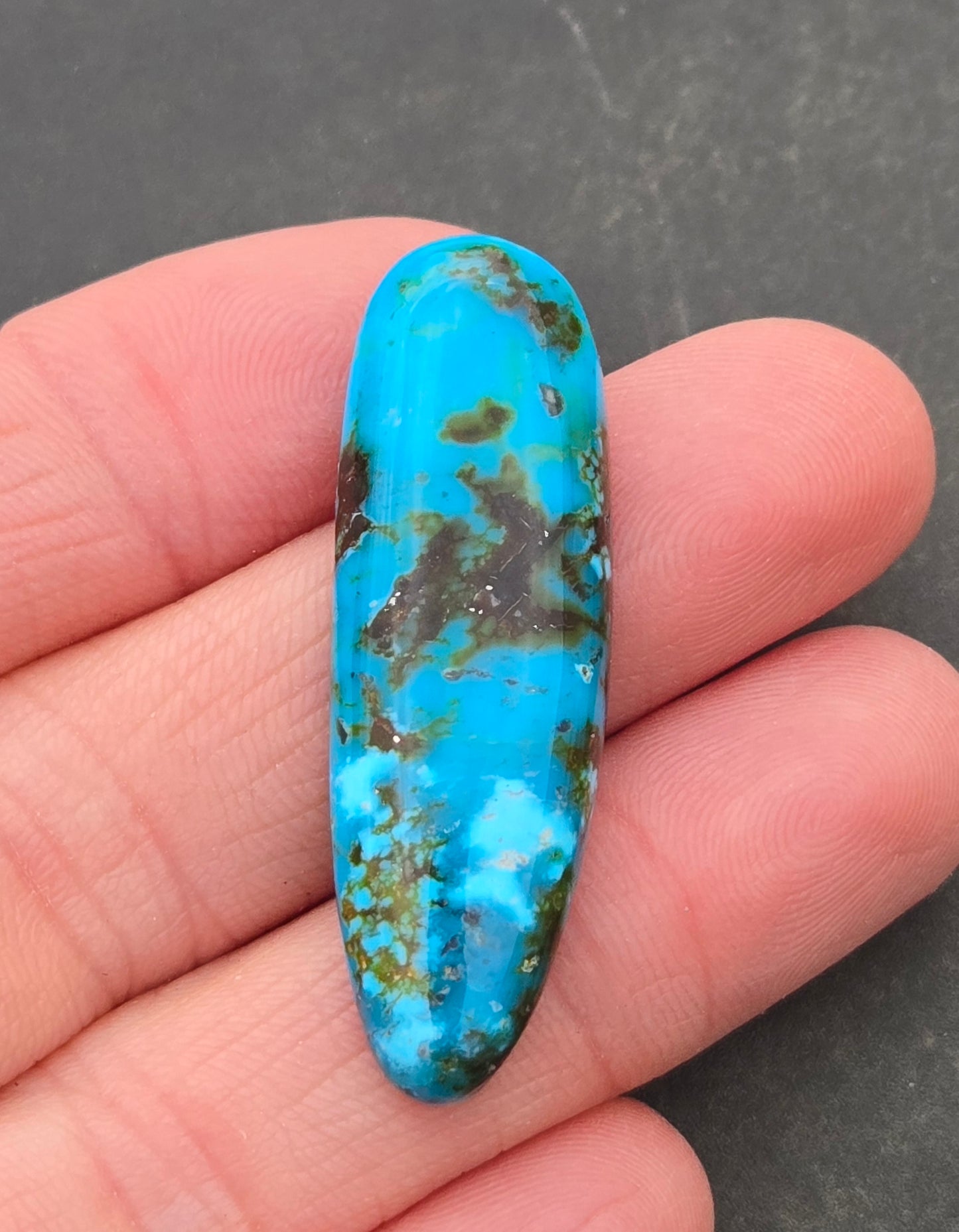 AAA Kingman Turquoise Mountain Red Web Cabochon