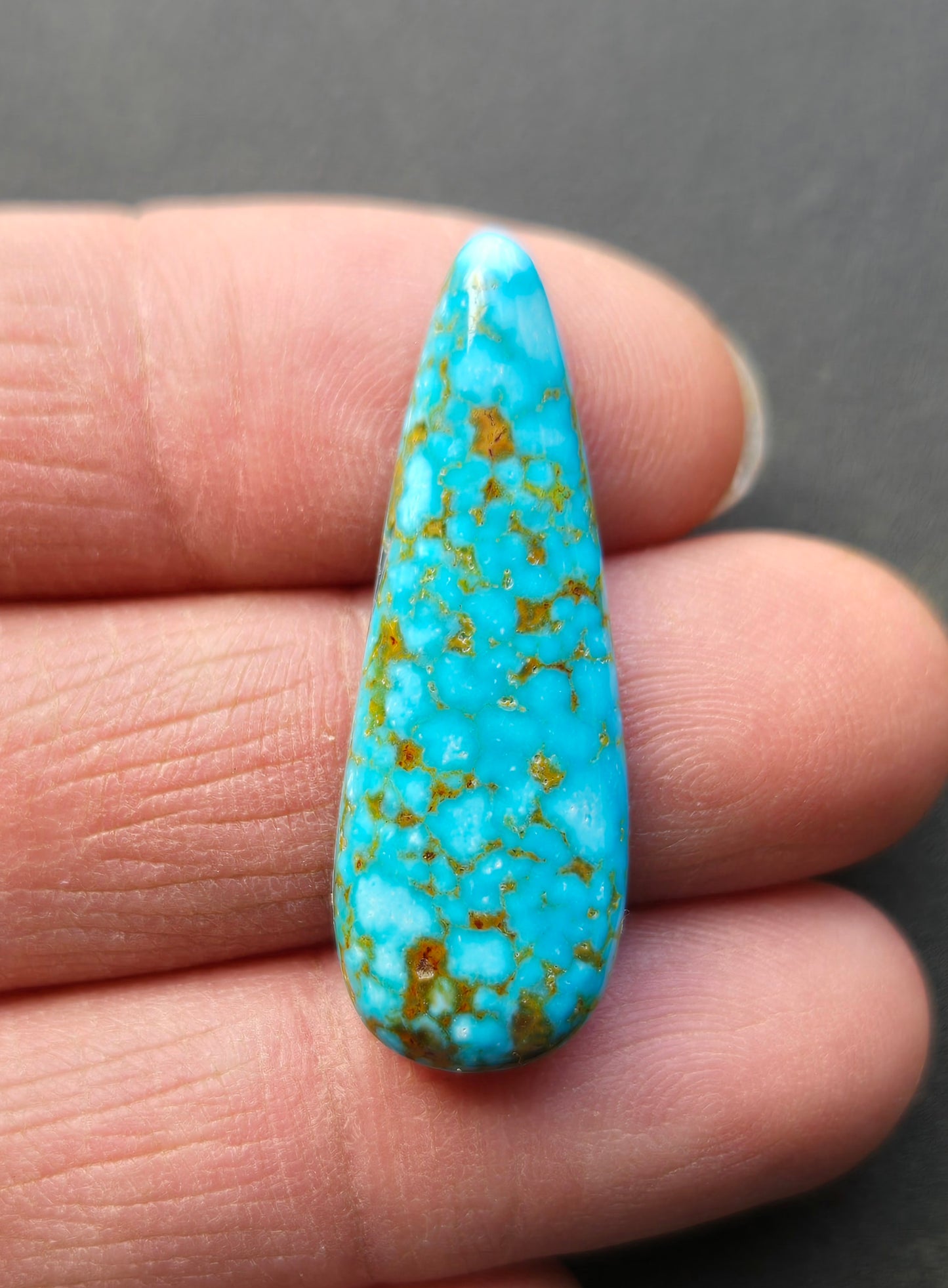 AAA Kingman Turquoise Mountain Red Web Cabochon
