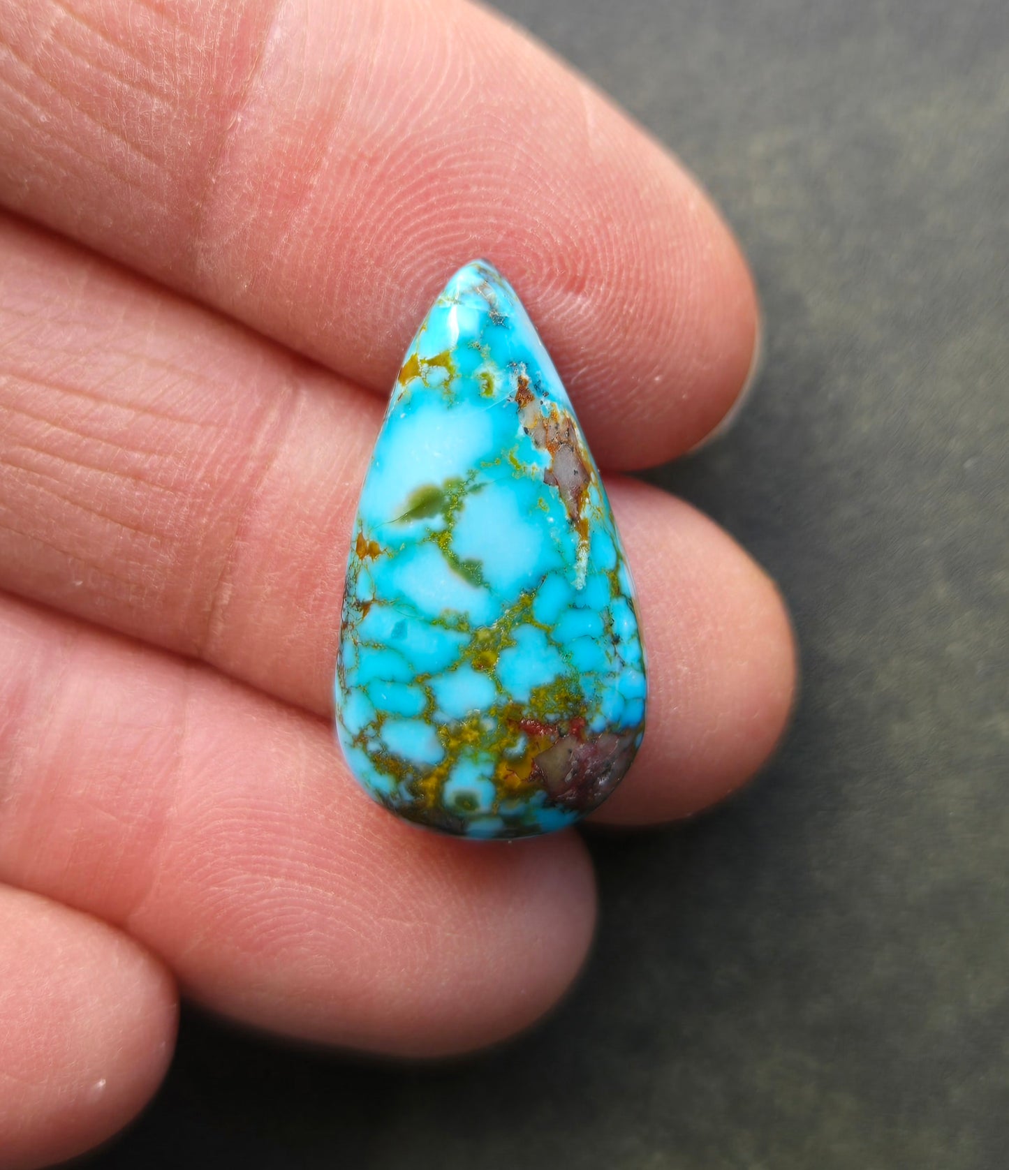 AAA Kingman Turquoise Mountain Red Web Cabochon