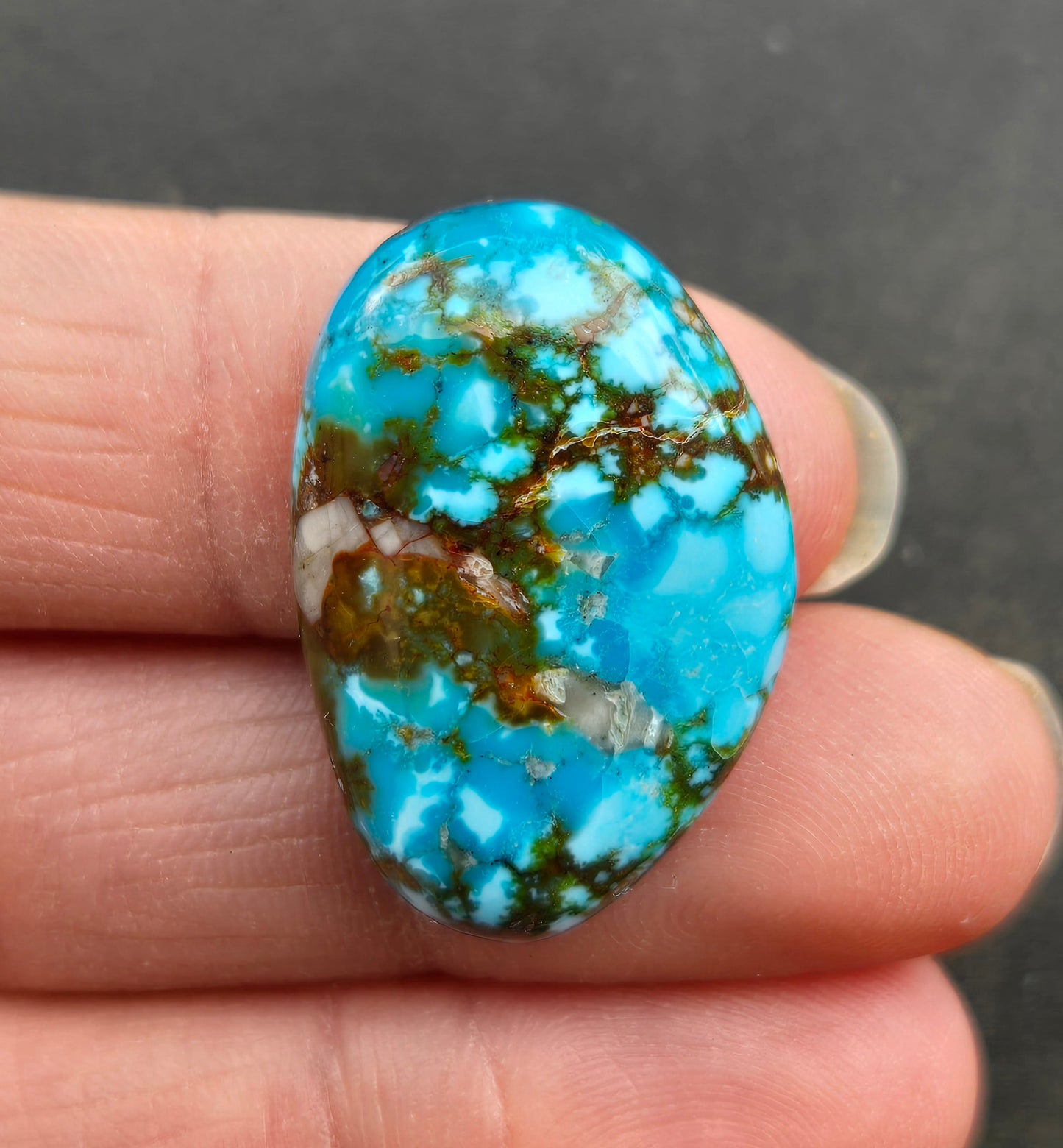 AAA Kingman Turquoise Mountain Red Web Cabochon