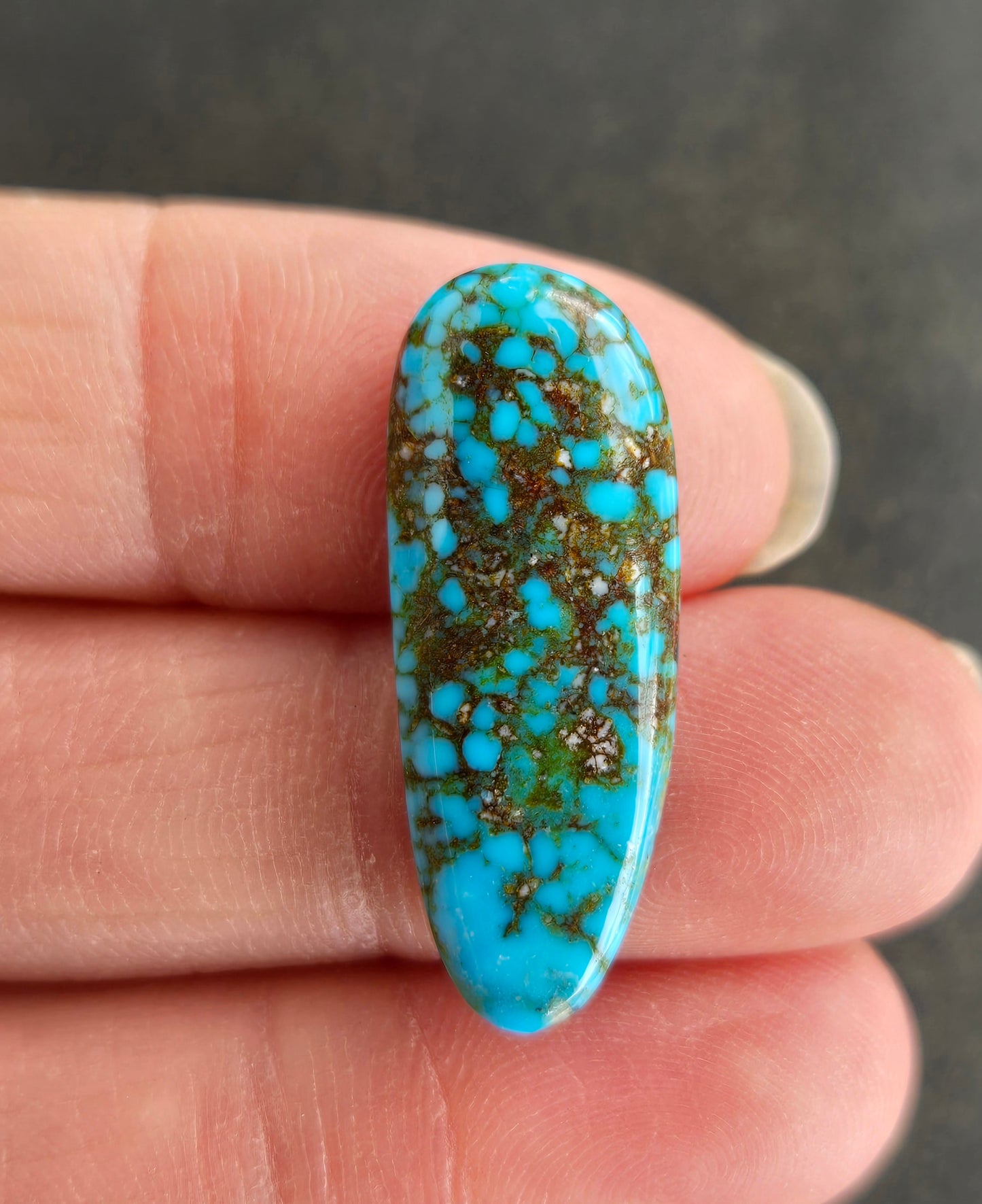 AAA Kingman Turquoise Mountain Red Web Cabochon