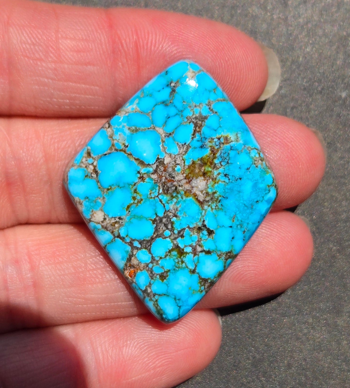 AAA Kingman Turquoise Mountain Red Web Cabochon