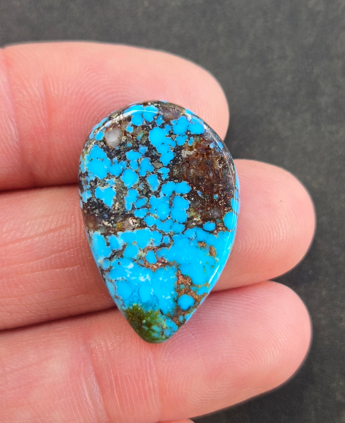 AAA Kingman Turquoise Mountain Red Web Cabochon