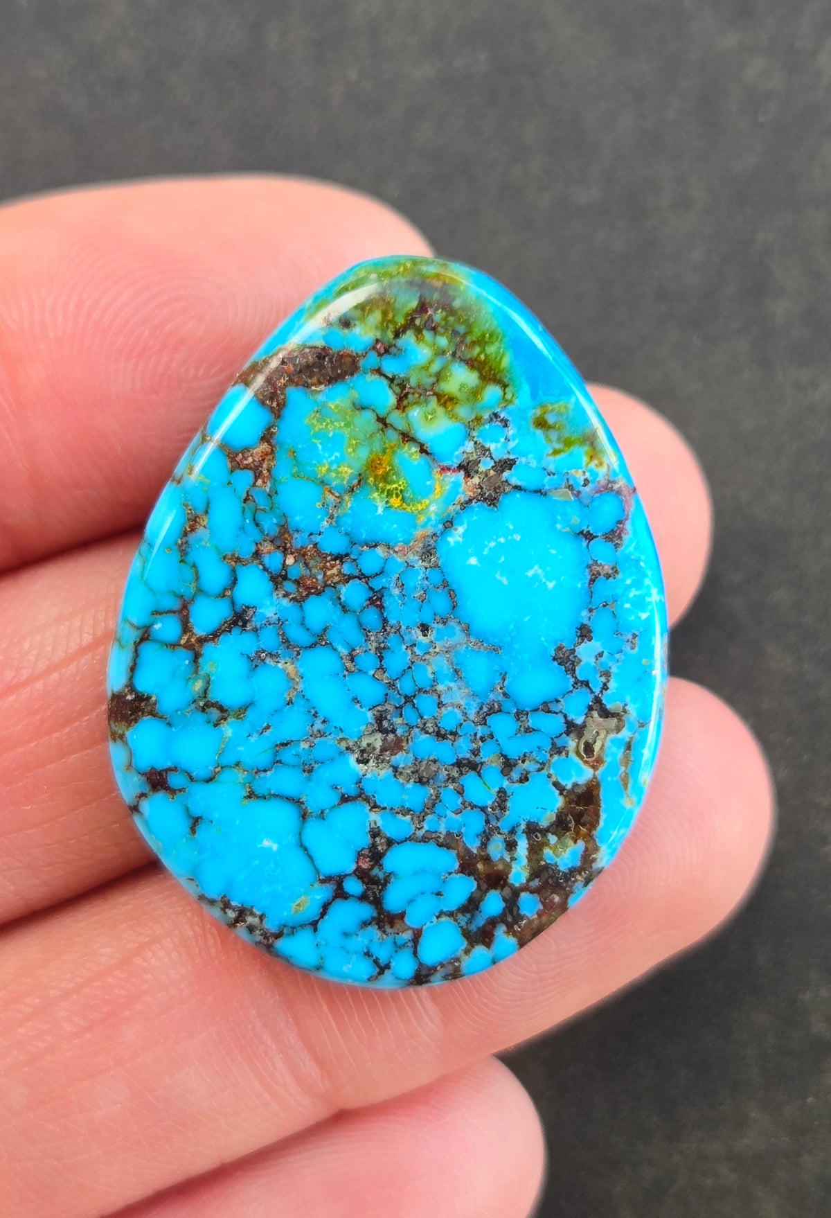 AAA Kingman Turquoise Mountain Red Web Cabochon