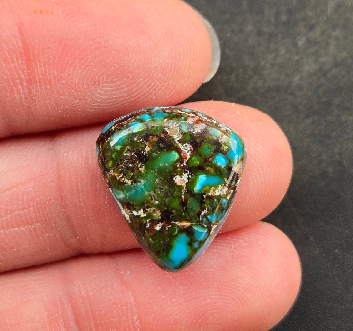 AAA Kingman Turquoise Mountain Red Web Cabochon