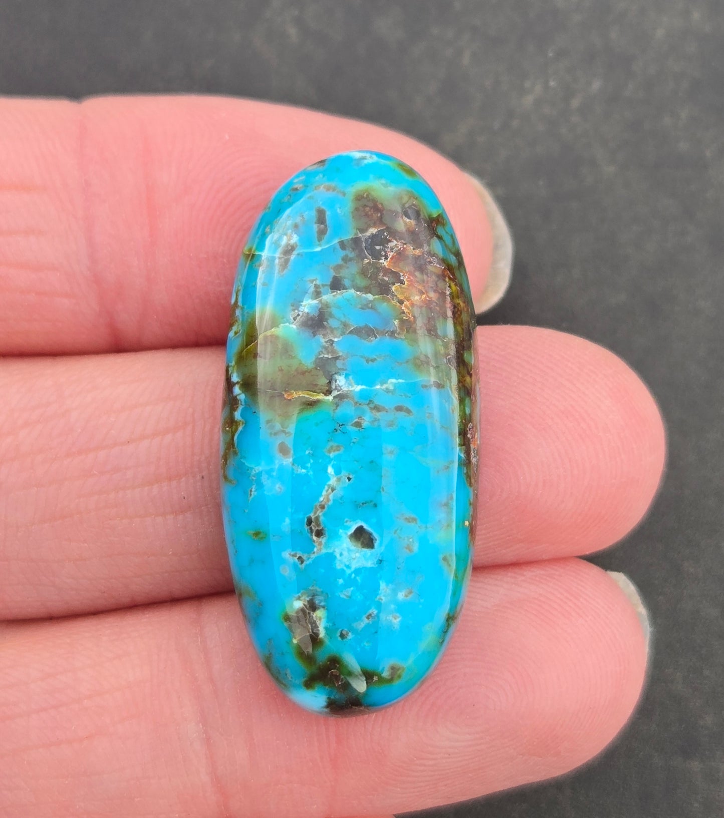 AAA Kingman Turquoise Mountain Red Web Cabochon