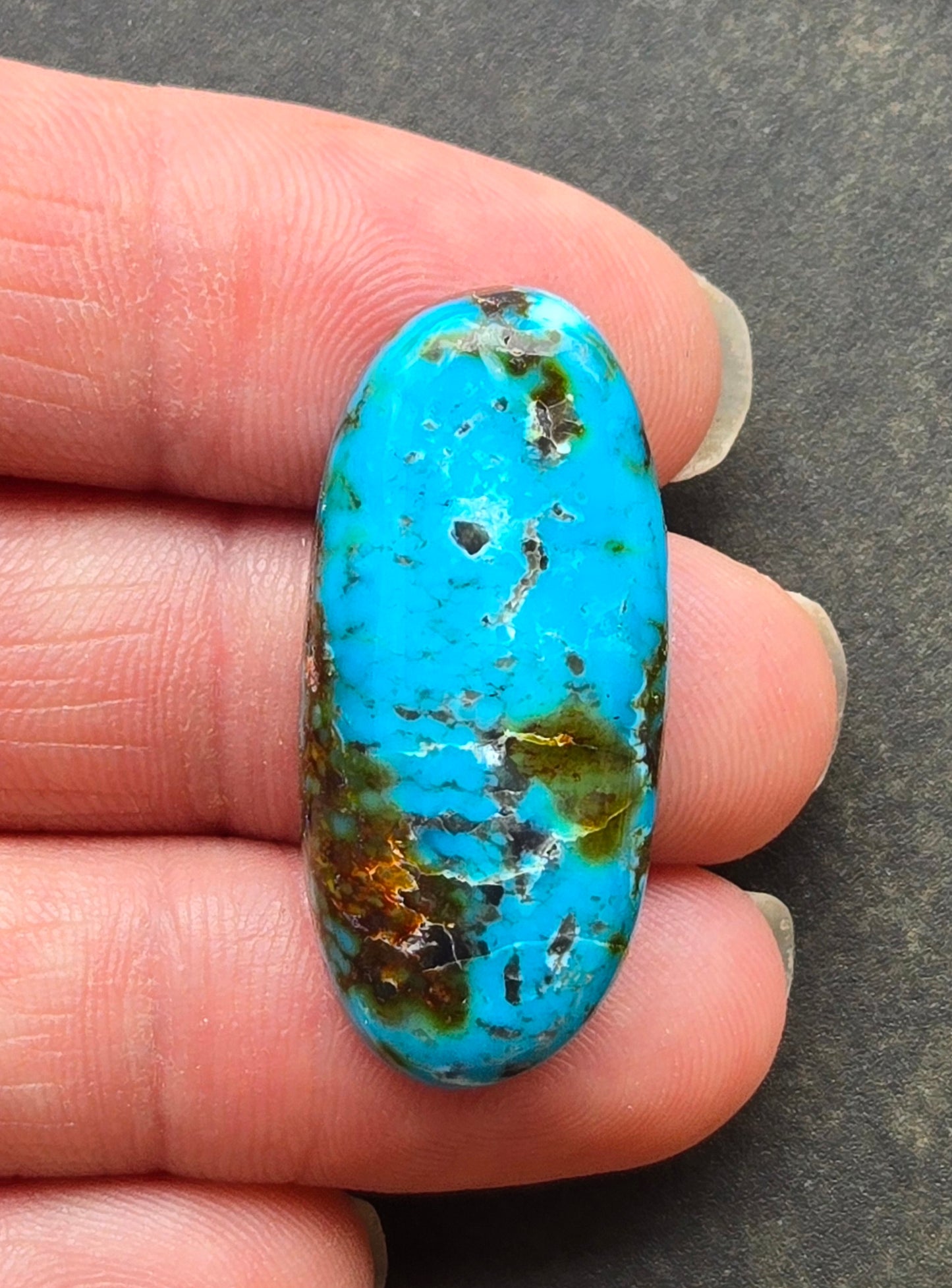 AAA Kingman Turquoise Mountain Red Web Cabochon